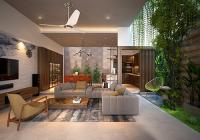 Phòng khách hiện đại với không gian xanh bên trong ở nhà liền kề tại Nam An Khánh